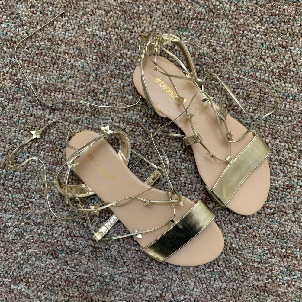 Never-worn Shoedazzle Gold sandals with stars